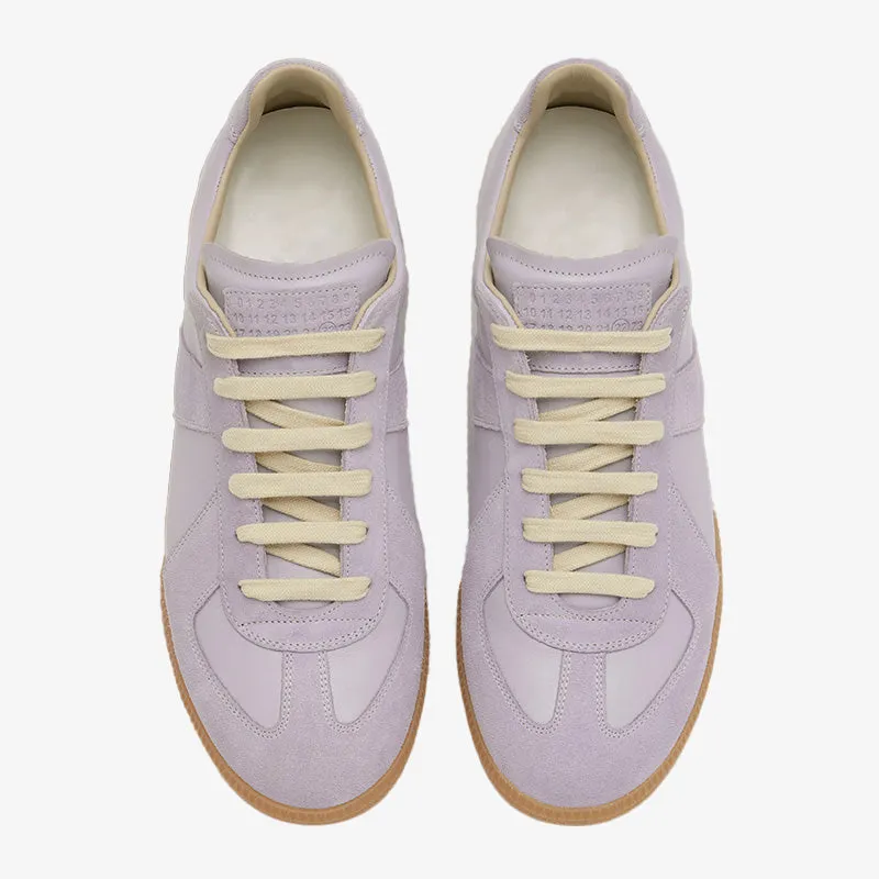 Iconic Purple Leather and Suede Sneakers